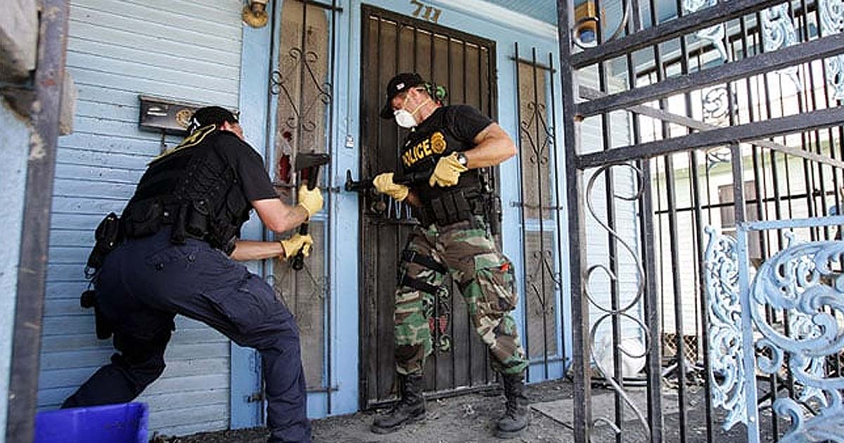 Police confiscating firearms and raiding homes during Hurricane Katrina