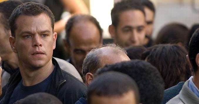 Jason Bourne in a Crowd being aware of his surroundings 