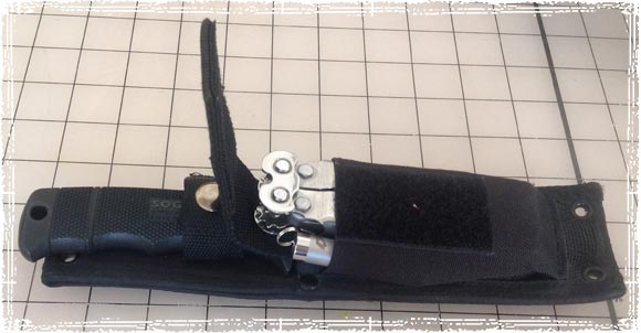 The Seal Pup Elite Sheath with a multi-tool in the pocket