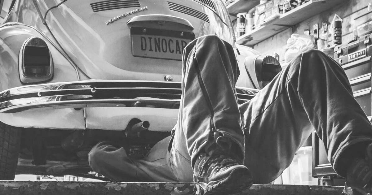 Guy working on his car